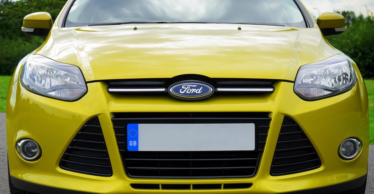 car ford automobile car wallpapers transportation vehicle design technology transport motor auto yellow front headlight logo badge