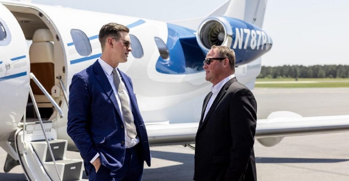 men discussion business plane private jet aviation