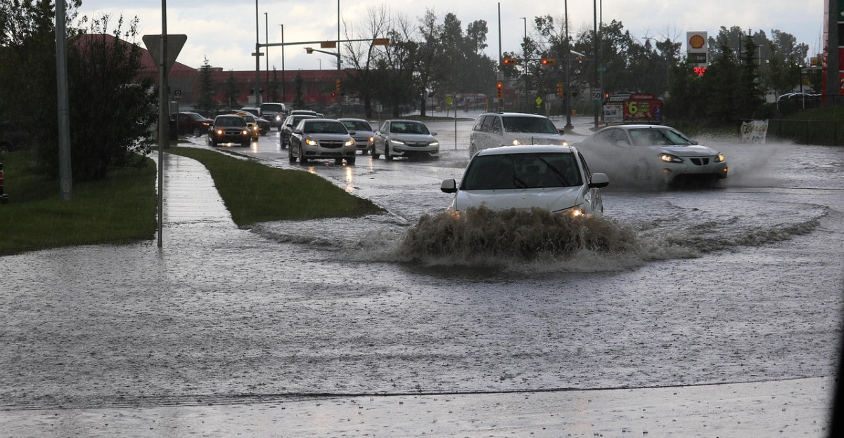 flooded road flood flooding storm rain water wet thunderstorm nature city