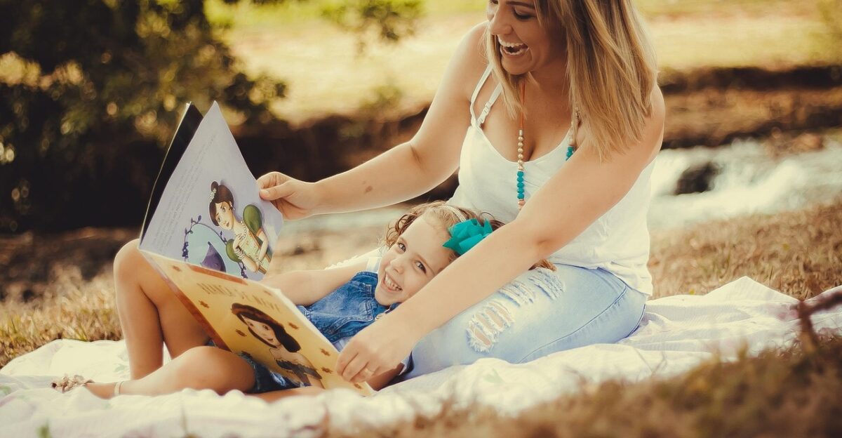 mother and daughter picnic storytime reading family love motherly love nature outdoors happy picnic picnic picnic picnic picnic storytime storytime family