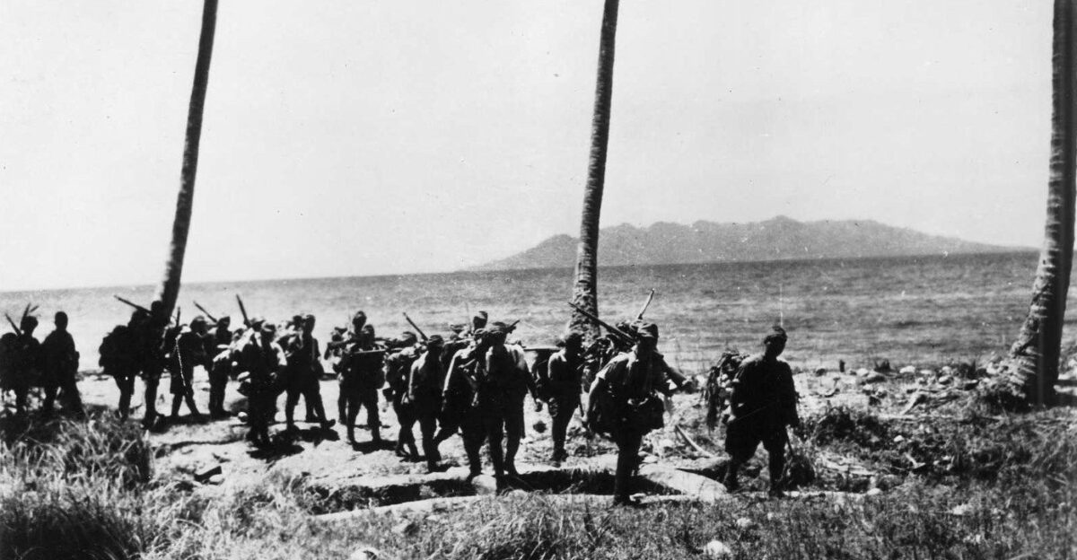Japanese troops arriving on Guadalcanal circa early September 1942 note Savo Island in background
