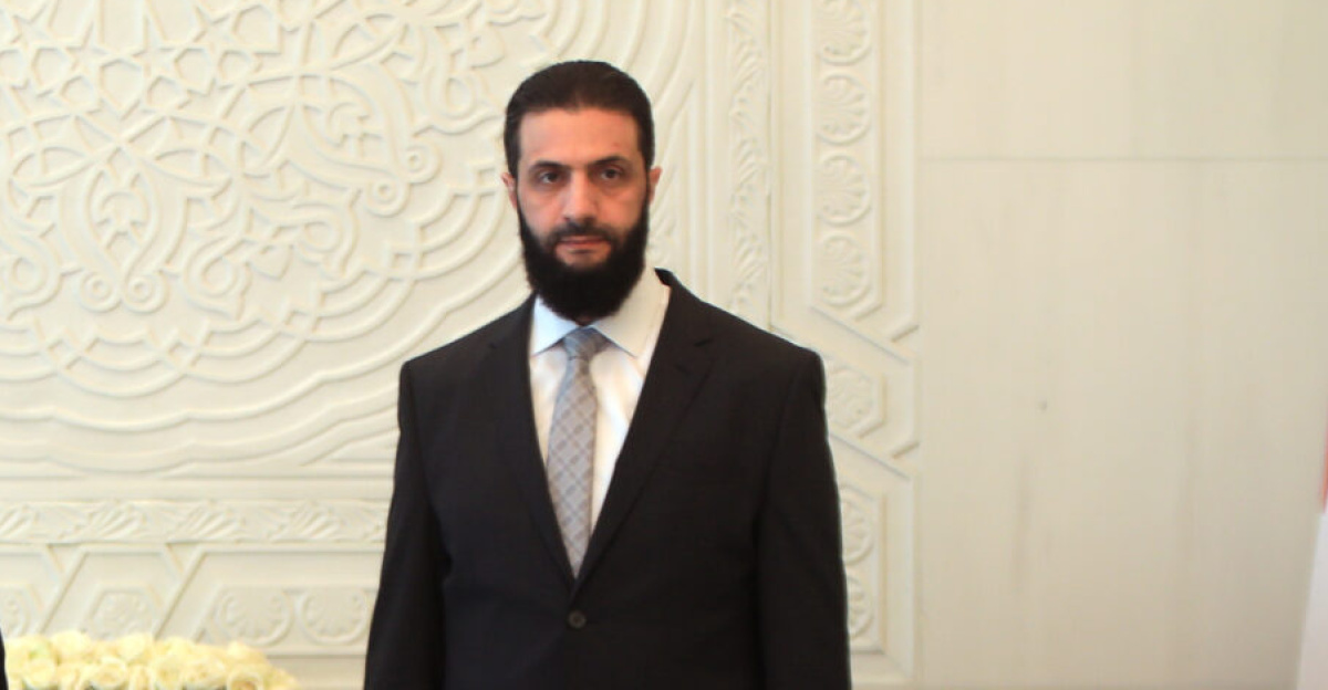 Ahmad al-Shara, President of the Syrian transitional government, center right and Hadja Lahbib, center left.