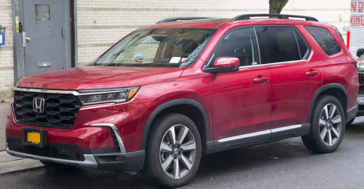 Honda Pilot Touring AWD in Radiant Red Metallic II Built in Lincoln AL model code YG1H7PKNW