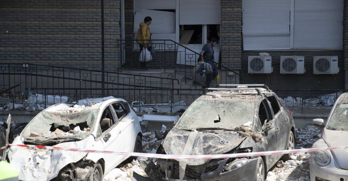 Cars near a 24-storey residential building in Kyiv damaged by fragments of a downed drone during Russian attack of Ukraine with kamikaze drones in the night on 30 May 2023 One person died four were injured articles 1 2
