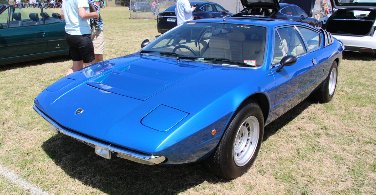 Founded in 1963 Lamborghini builds luxury sports cars The wedge shaped Urraco was a more affordable 2 2 sports car built from 1973-79 791 were built It was a good looking car with a steep windshield a sharp front with pop-up headlights large wide opening doors Similar to the Miura the V8 engine was mid-mounted but that s where the comparison ended The Miura was a full blooded exotic supercar the Urraco on the other hand was not as impressive it was merely a nice touring car Three models were built the 180hp 1994cc V8 P200 the 220hp 2463cc V8 P250 and the 250hp 2996cc V8 P300