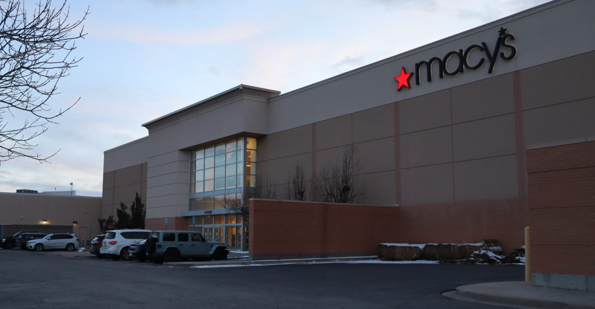The facade of a Macy's department store on the night of it's announced closure.