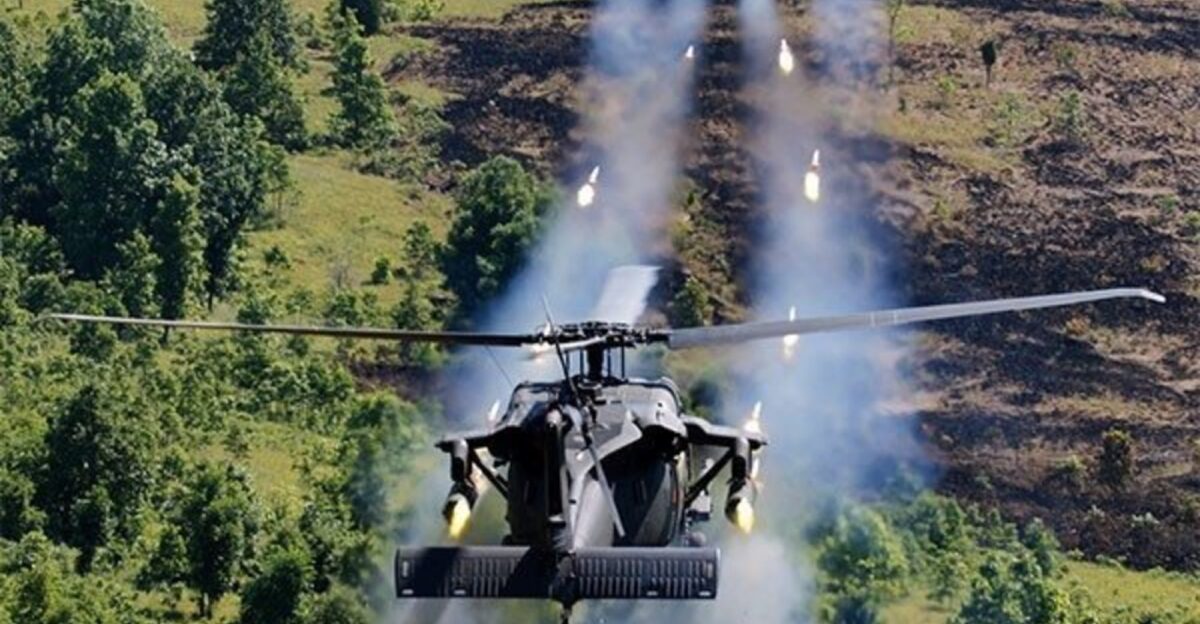 w U S Army s w 160th Special Operations Aviation Regiment Airborne s MH-60M Direct Action Penetrator DAP firing 2 75 in 7 0 cm rockets on a U S Army test ground