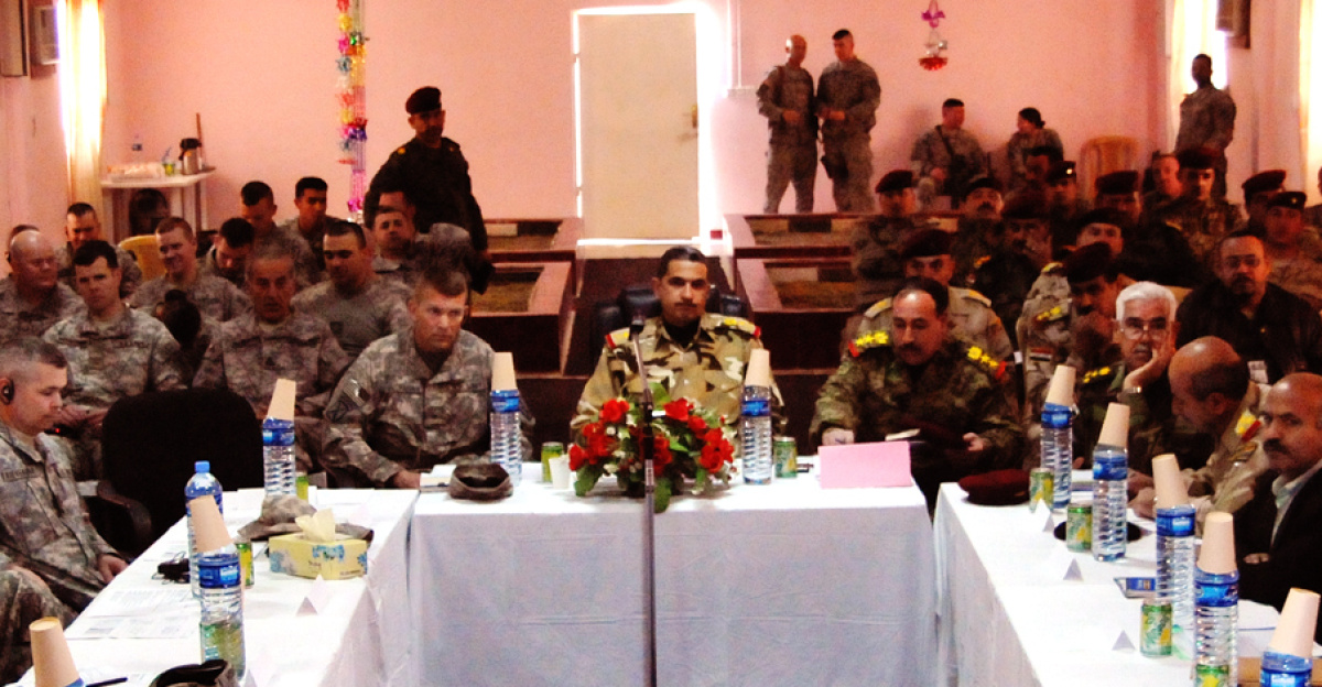 Lt. Gen. Ali Salih Farhood Oothman, 8th Iraqi army Div. commander, hosts an SoI coordination meeting with coalition forces and Iraqi government and military leaders at the 8th IA Div. headquarters on Jan. 21. Leaders discussed the IA's management of the program in southern Iraq.