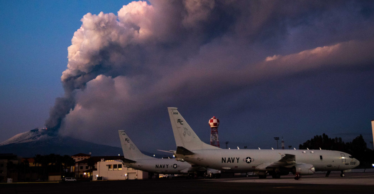SIGONELLA, Italy (Feb. 16, 2021) Mt. Etna lets off some steam in the background of P-8A Poseidon maritime patrol aircraft assigned to the "Grey Knights" of Patrol Squadron (VP) 46, Feb. 16, 2021. VP-46 is currently forward-deployed to the U.S. 6th Fleet area of operations and is assigned to Commander, Task Force 67, responsible for tactical control of deployed maritime patrol and reconnaissance squadrons throughout Europe and Africa. U.S. 6th Fleet, headquartered in Naples, Italy, conducts a full spectrum of joint and naval operations, often in concert with allied and interagency partners, in order to advance U.S. national security interests and stability in Europe and Africa. (U.S. Navy photo by Mass Communication Specialist 2nd Class Austin Ingram) 210216-N-VH871-1048