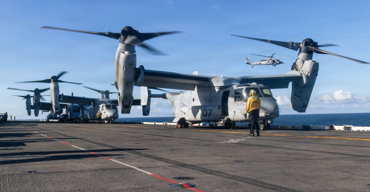 CARIBBEAN SEA– U.S. Marine Corps MV-22B Osprey tiltrotor aircraft with Marine Medium Tiltrotor Squadron (VMM) 263 (Reinforced), 22nd Marine Expeditionary Unit (Special Operations Capable), prepare for flight operations aboard Wasp-class amphibious assault ship USS Iwo Jima (LHD 7) while underway in the Caribbean Sea, Oct. 29, 2025. U.S. military forces are deployed to the Caribbean in support of the U.S. Southern Command mission, Department of War-directed operations, and the president’s priorities to disrupt illicit drug trafficking and protect the homeland. (U.S. Marine Corps photo)