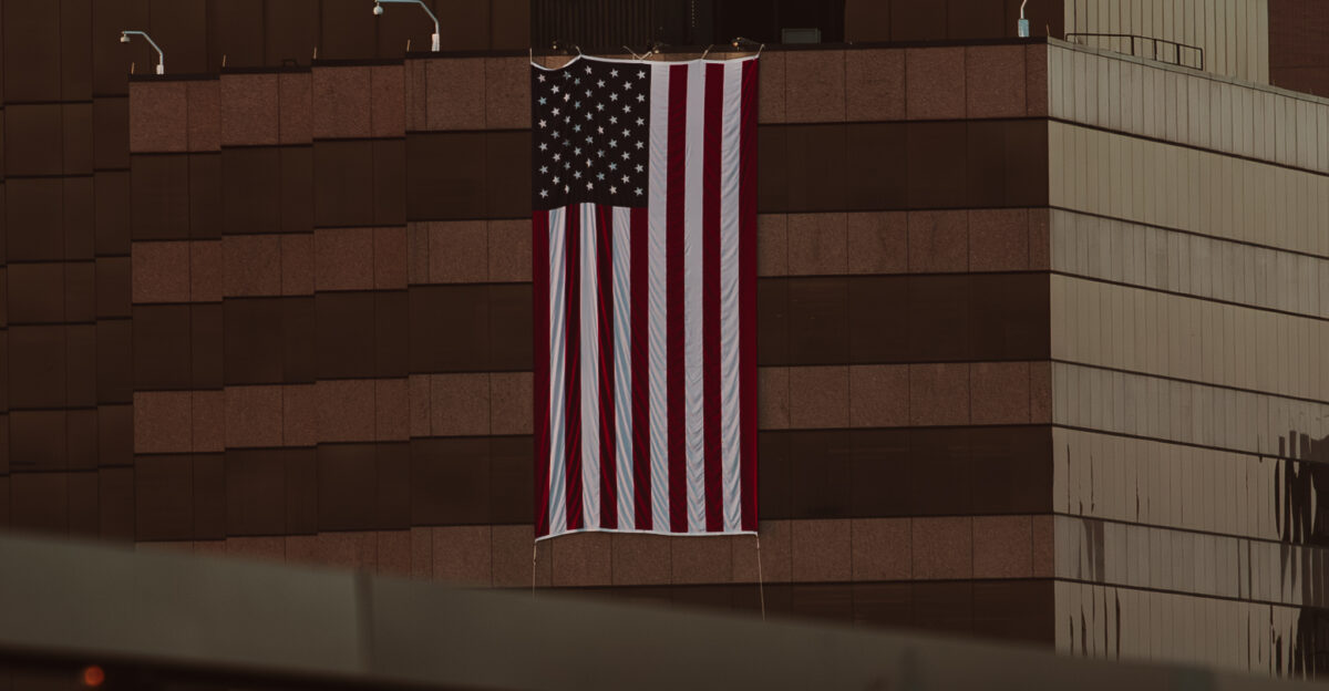 Deputy Secretary of Defense Kathleen H Hicks Chairman of the Joints Chiefs of Staff U S Air Force Gen CQ Brown Jr Vice Chairman of the Joint Chiefs of Staff U S Navy Adm Christopher W Grady and other officials stand for a flag unfurling during an observance ceremony at the National 9 11 Pentagon Memorial to honor the 184 lives lost in the 2001 terrorist attack at the Pentagon Washington D C Sept 11 2024 DoD photo by U S Air Force Senior Airman Madelyn Keech