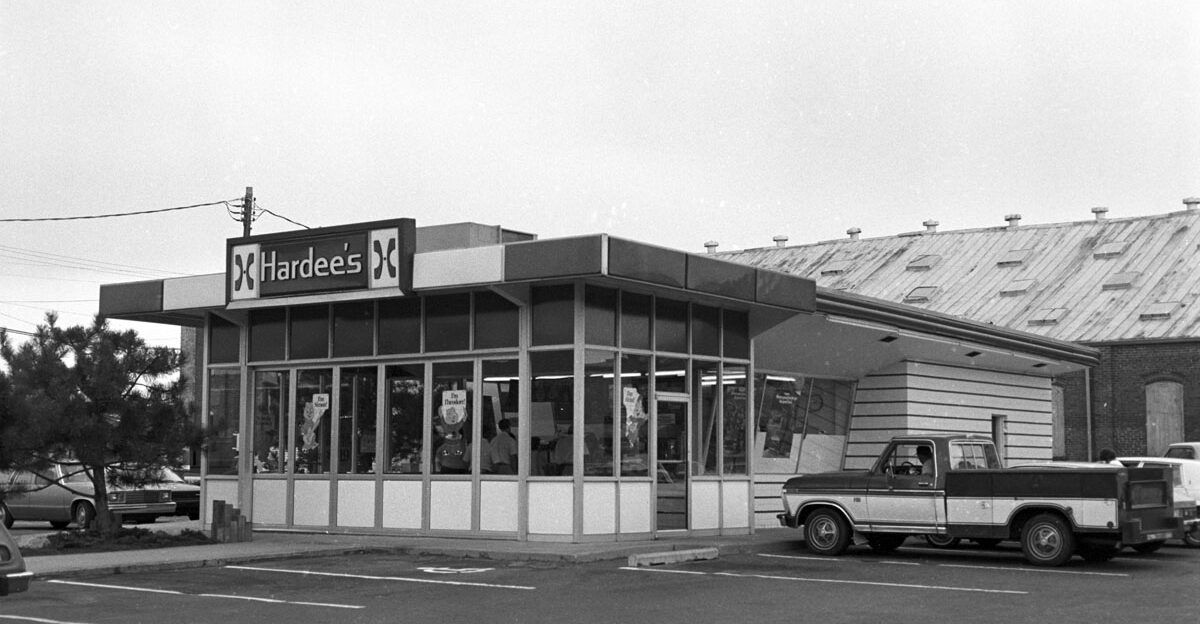 Hardees 1 - the original Hardees franchise restaurant McDonald Street Rocky Mount NC early 1980 s This location was razed shortly after these photos were taken Hardees founder Wilbur Hardee opened his first restaurant in Greenville NC on September 9 1960 The first franchise Hardees 1 opened in Rocky Mount in May 1961 and was run by James Carson Gardner and Leonard Rawls According to Wilbur Hardee Gardner and Rawls won a controlling share of the company from him in a game of poker After realizing that he lost control over his namesake company Hardee sold his remaining shares to them as well The chain grew and prospered and was headquartered in Rocky Mount until 2001 when Hardees was purchased by the parent company of Carl s Jr and moved its headquarters to St Louis MO From the General Negative Collection State Archives of North Carolina Raleigh NC