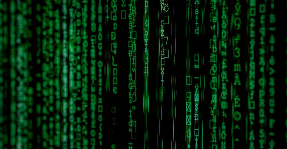Abstract green matrix code background with binary style