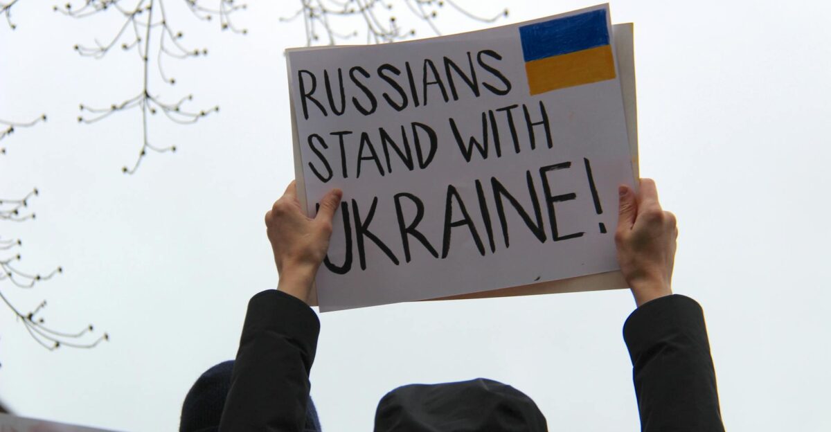 Protesters in Vancouver hold signs supporting Ukraine against Russian actions