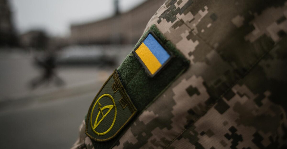 Detailed shot of Ukrainian military uniform with flag patch symbolizing national pride