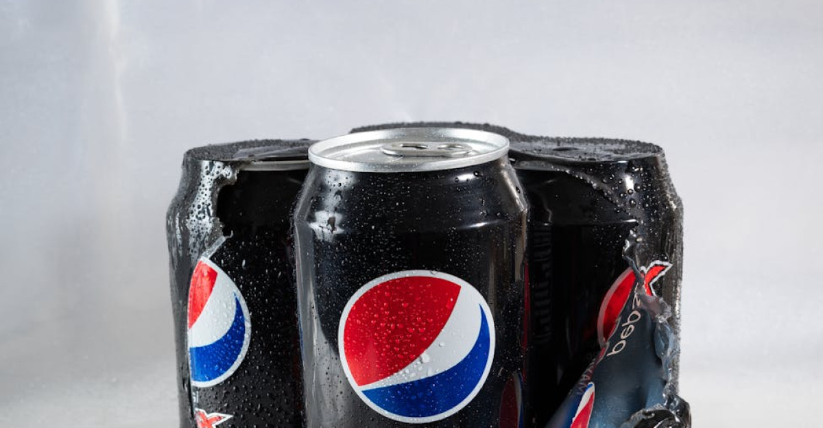 Cold Pepsi Max cans in packaging covered with droplets for a refreshing feel