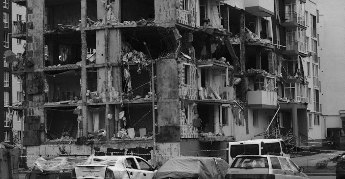 A devastated apartment building in Bucha Ukraine showing the effects of war