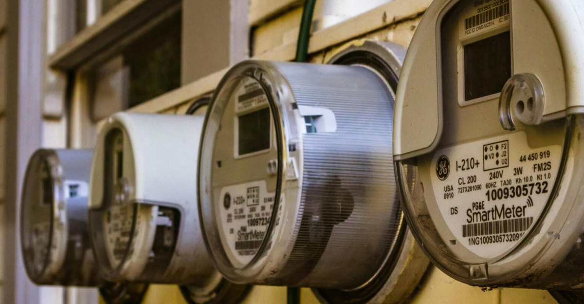Image of multiple smart electricity meters installed on a residential exterior wall, showing environmental adaptation.