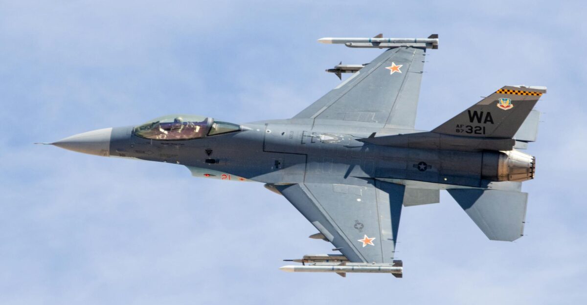 F-16 jet flying over Nellis Air Force Base Nevada showcasing its sleek design and power