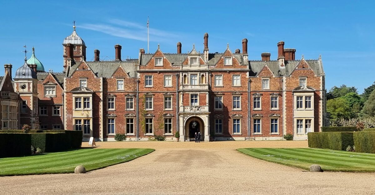 A stunning view of the Sandringham House facade showcasing its historic architecture in Norfolk England