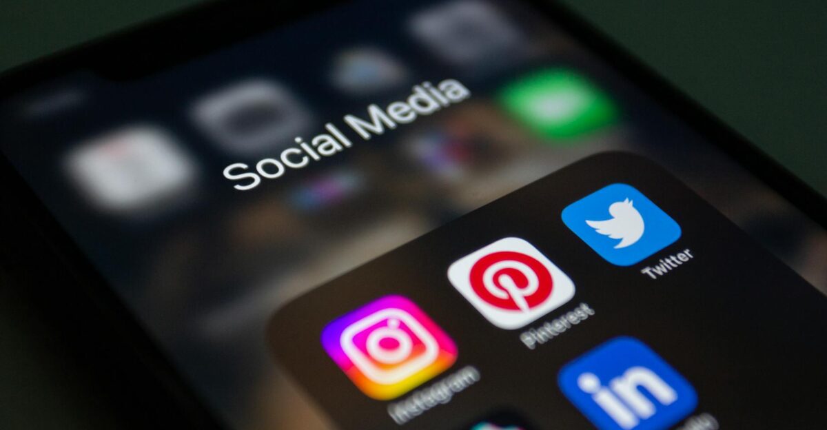 A smartphone screen displaying popular social media applications like Instagram and Twitter