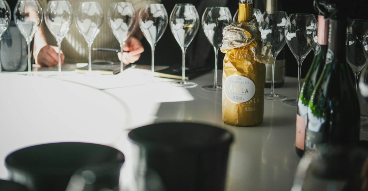 Chic champagne tasting with wine glasses and bottles in A Grand Est France