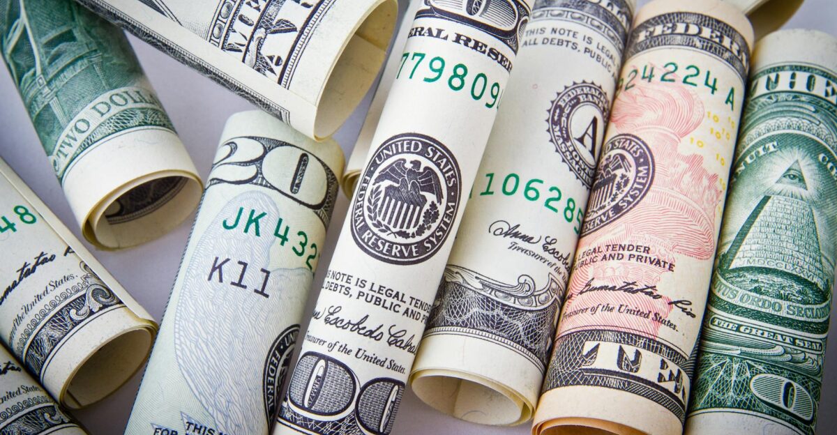Close-up of rolled US dollar bills symbolizing wealth financial success and currency