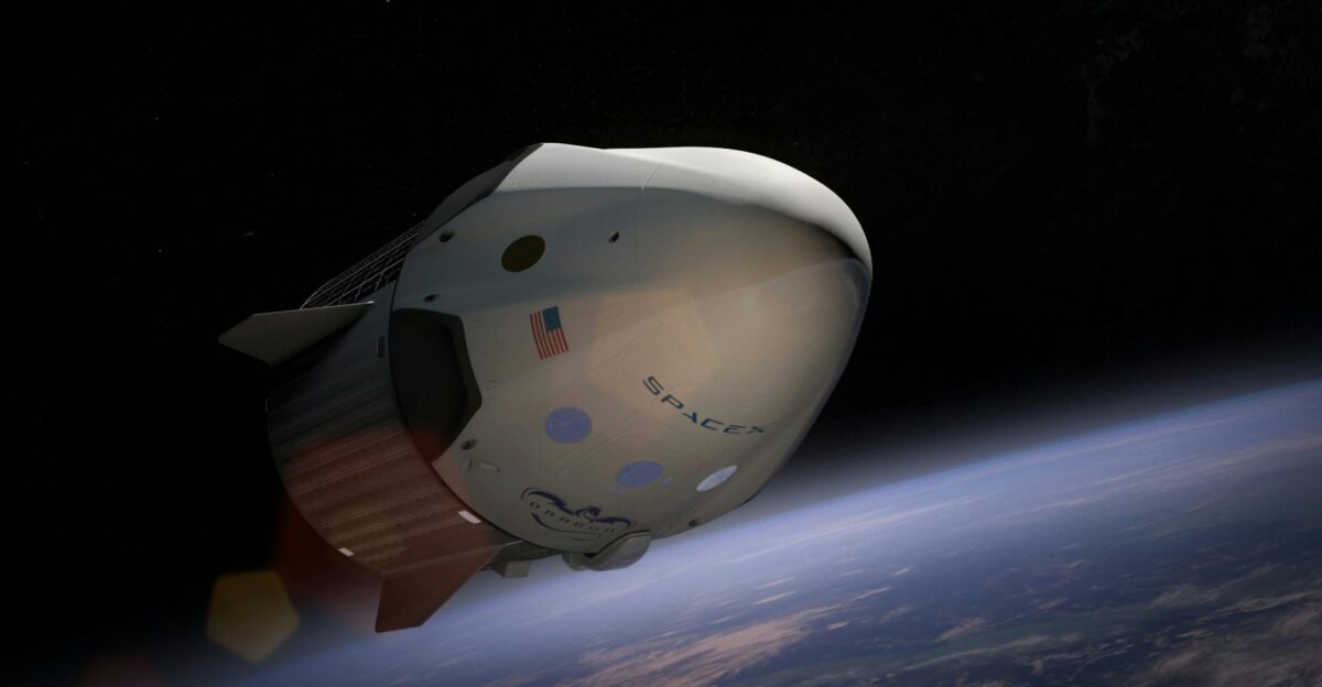 A SpaceX Dragon spacecraft orbiting Earth captured in vivid detail against space