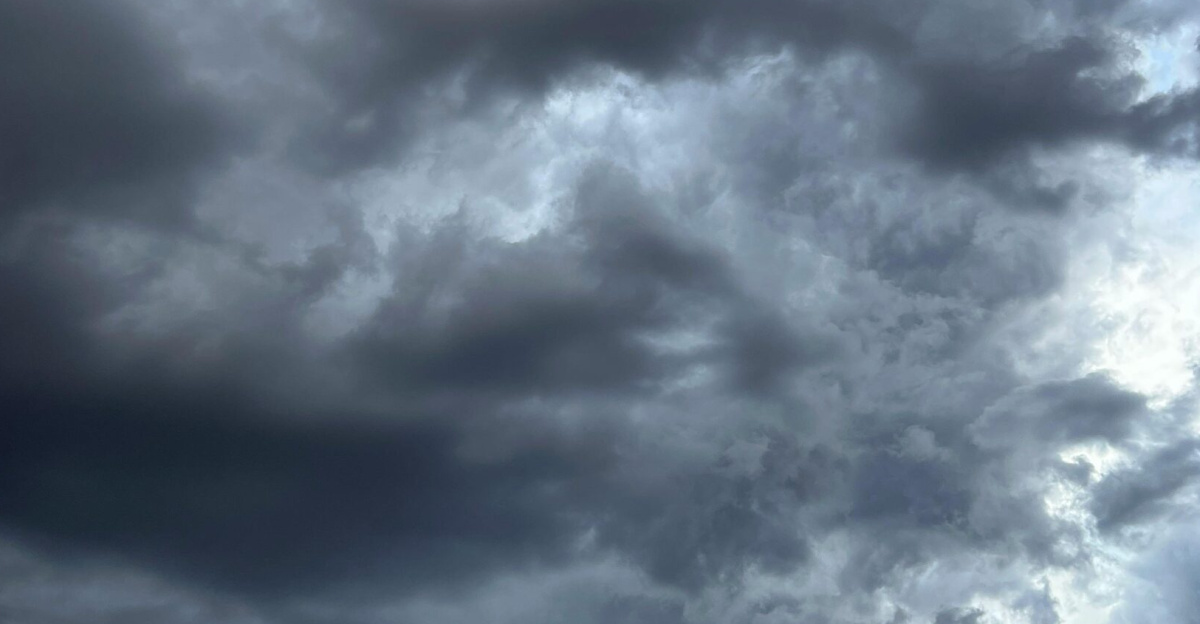 Dark and moody clouds forming during a thunderstorm, showcasing atmospheric drama.