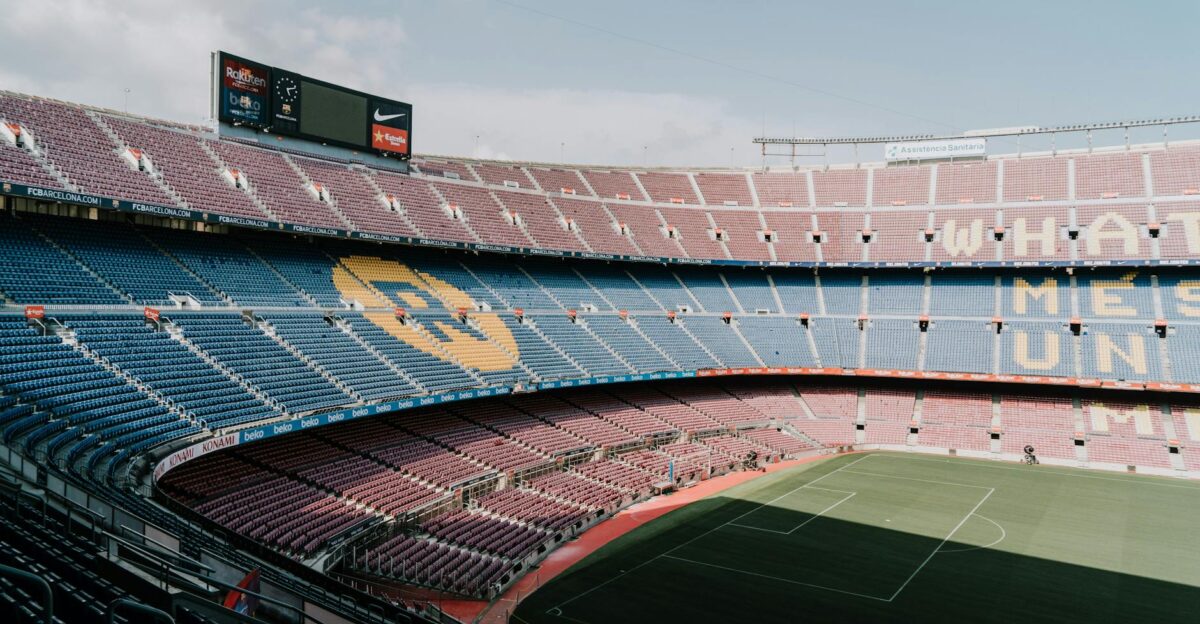View of Camp Nou stadium in Barcelona showcasing the iconic stands and field