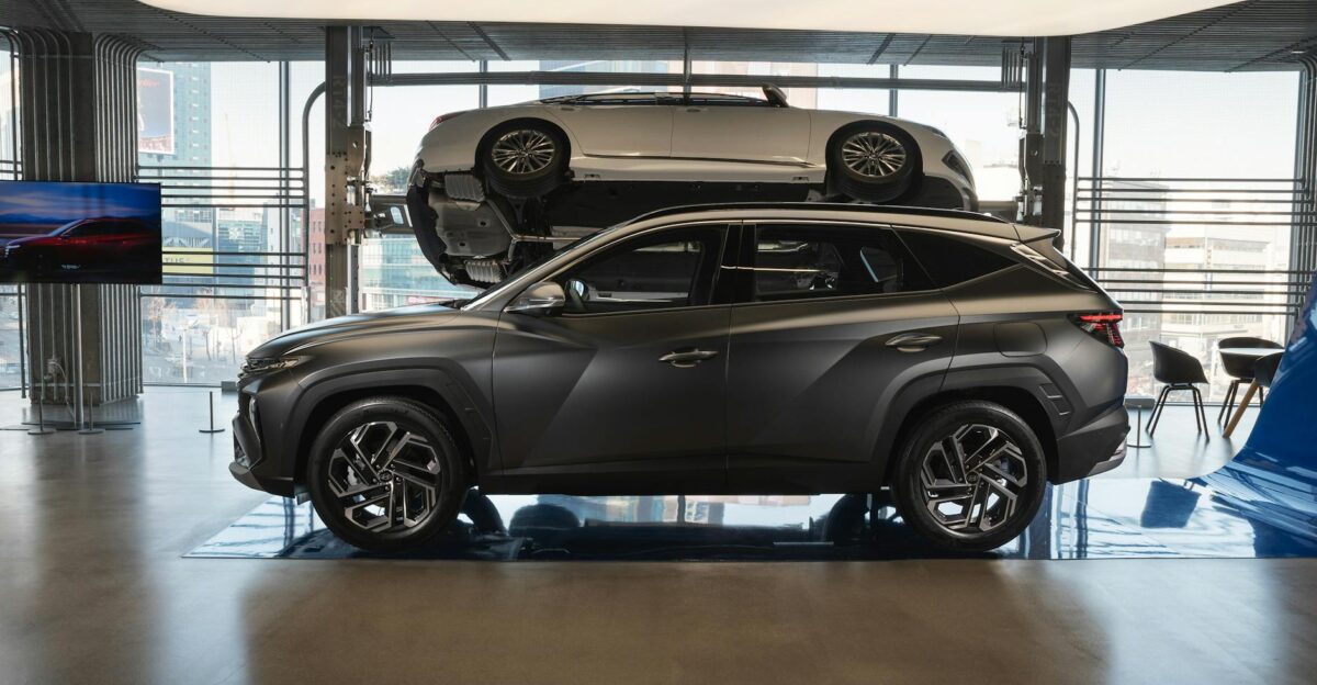 Sleek gray Hyundai Tucson showcased in a contemporary studio with natural lighting