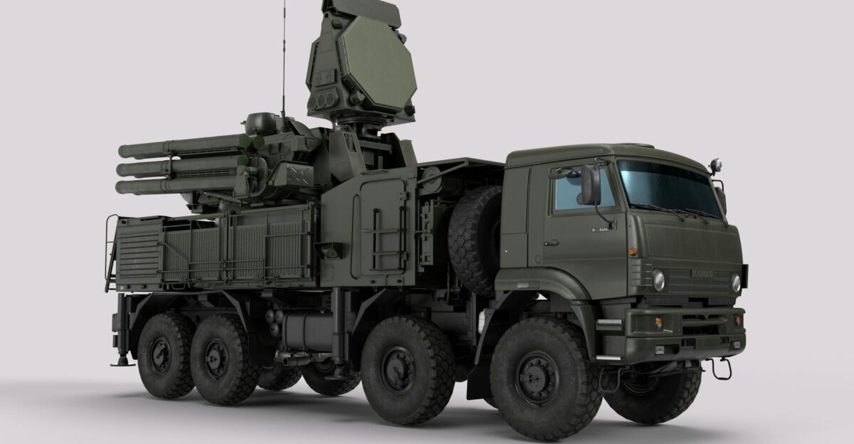 Detailed image of a military vehicle equipped with advanced radar and weaponry systems