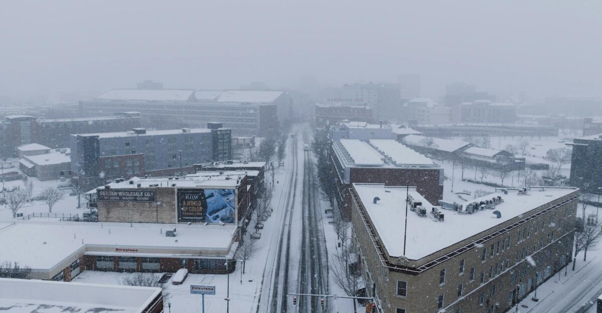 Aerial shot of Chattanooga city in heavy snowfall depicting a winter urban landscape