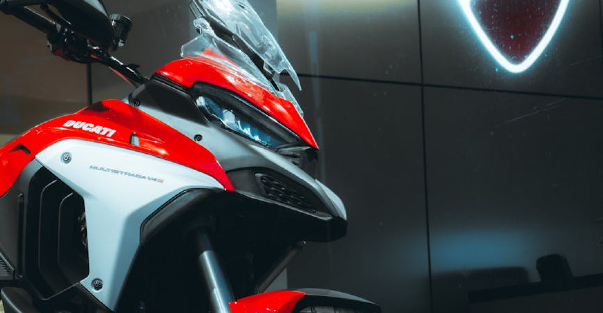 Close-up of a Ducati motorcycle display in a Bengaluru showroom