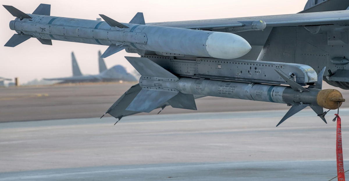 Detailed view of a military missile mounted on an aircraft wing at an airbase in Bengaluru.