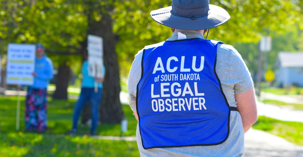 Legal observer at a South Dakota protest, ensuring rights protection during public demonstration.