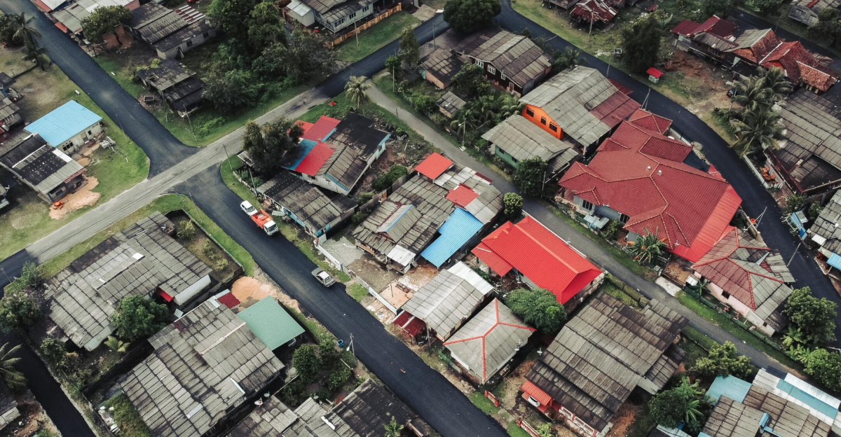 Aerial view showcasing a vibrant residential neighborhood with colorful rooftops.