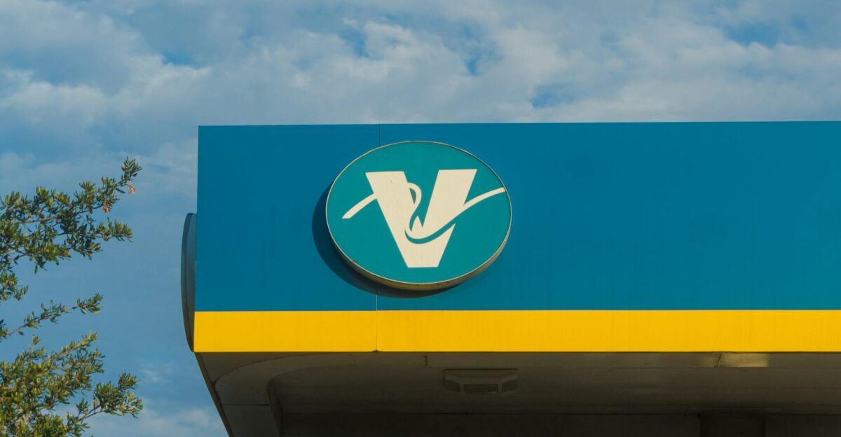 Close-up of Valero gas station canopy in Houston Texas with blue sky background
