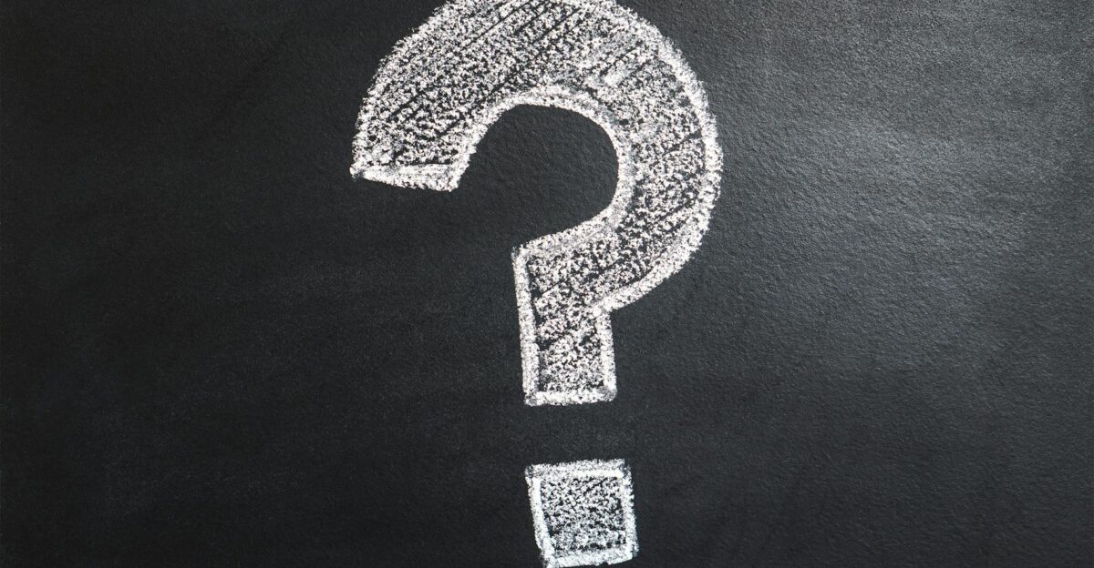 A conceptual image featuring a question mark drawn on a chalkboard ideal for problem-solving contexts