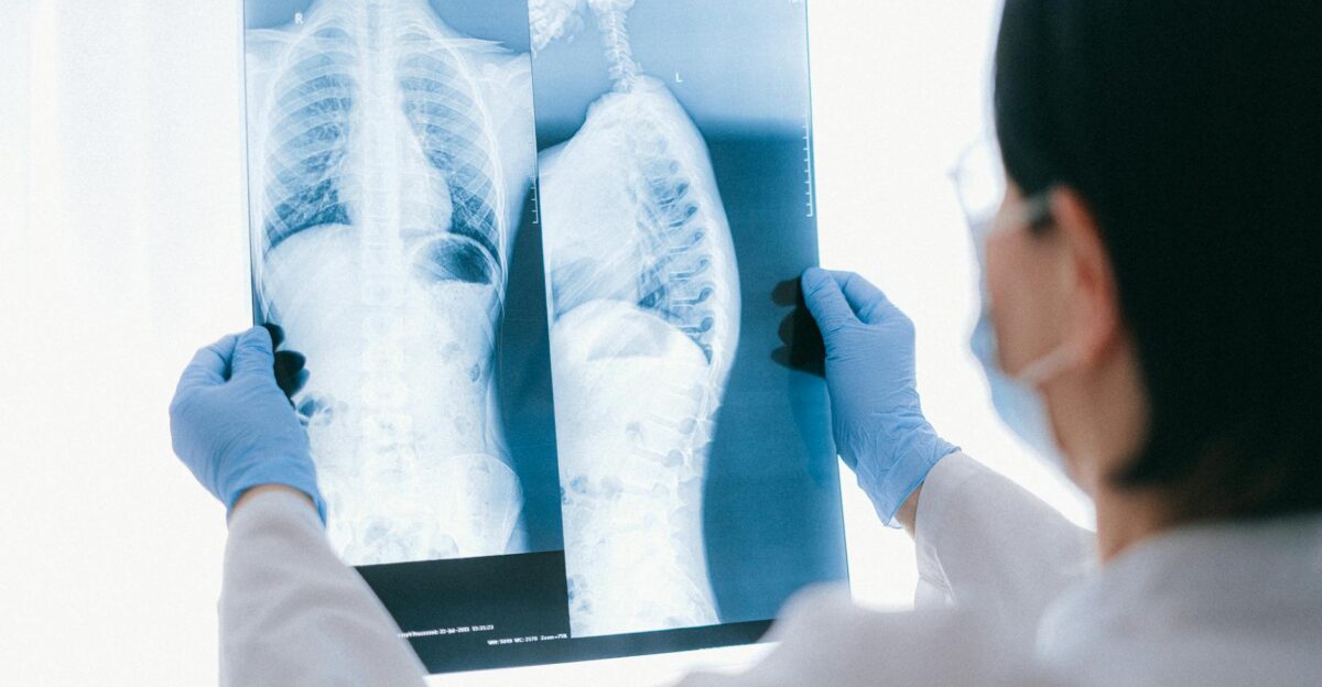 Medical professional analyzing chest x-ray images in a clinical setting for diagnostic purposes