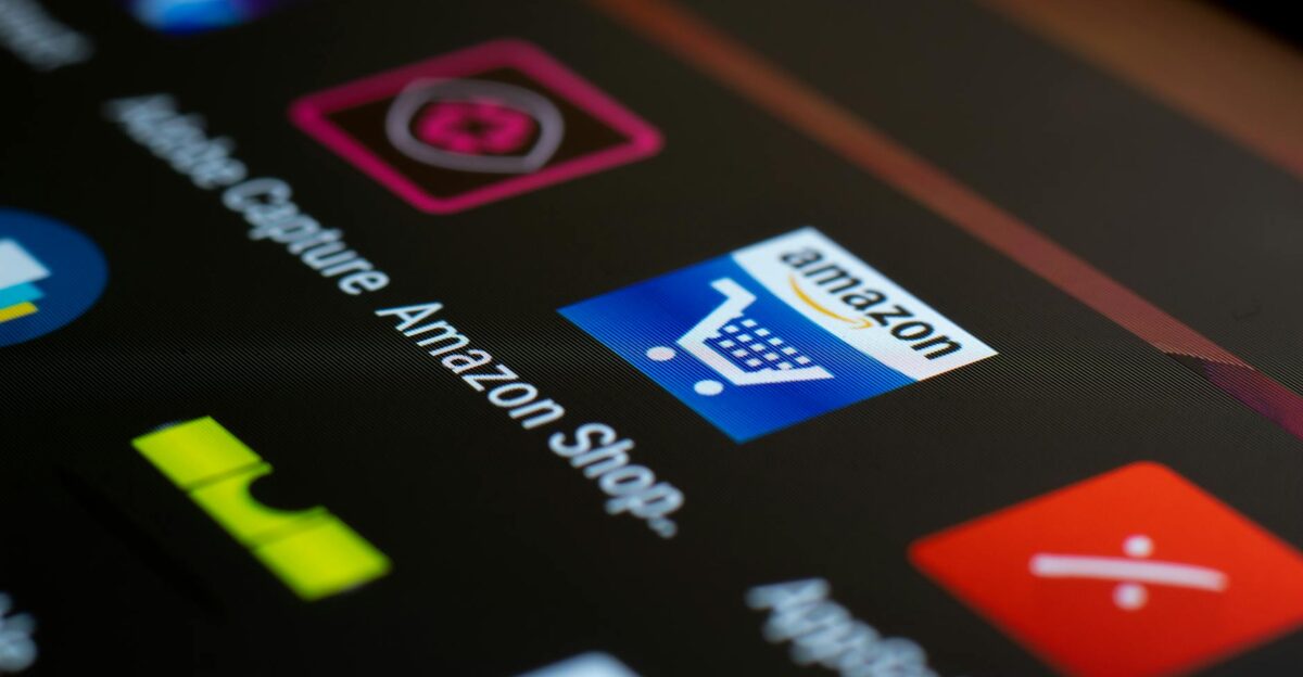 Close-up of the Amazon shopping app icon on a smartphone screen Ideal for online shopping and technology themes
