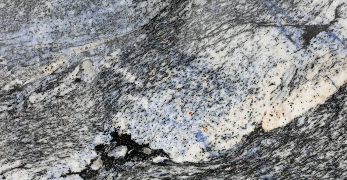 Detailed close-up of a textured granite surface showcasing natural patterns