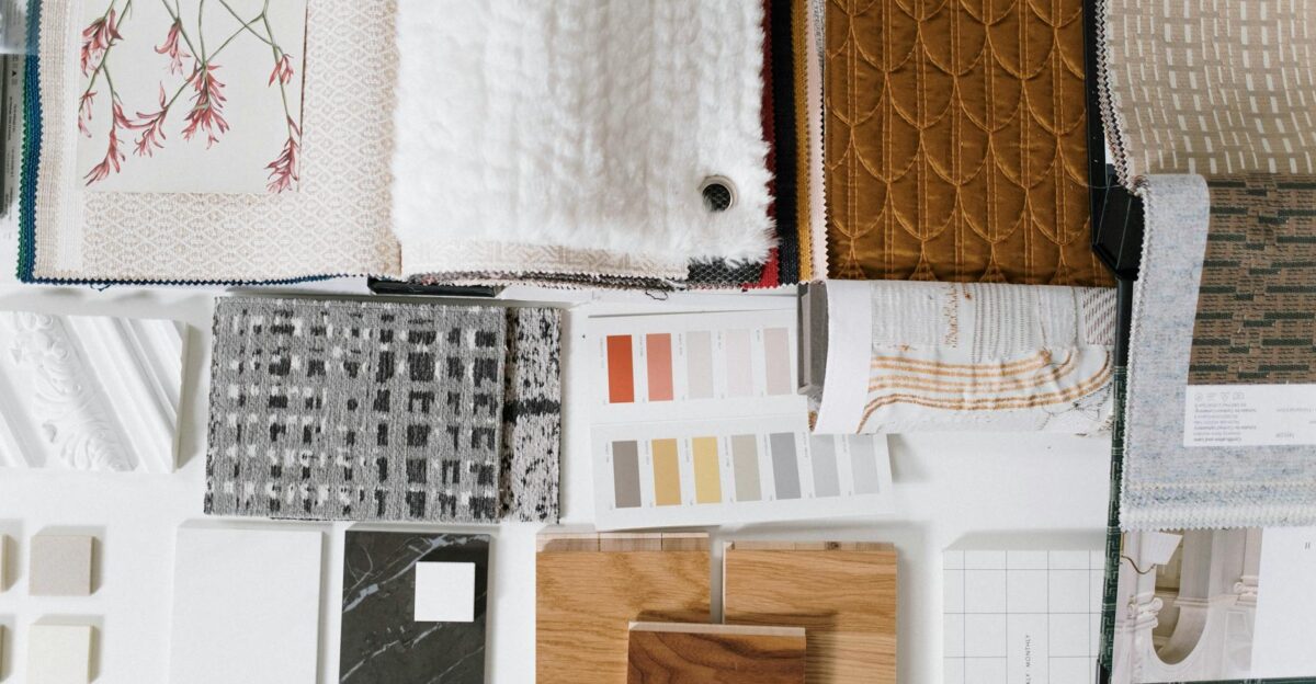 Assorted fabric and textile samples with color swatches for design inspiration