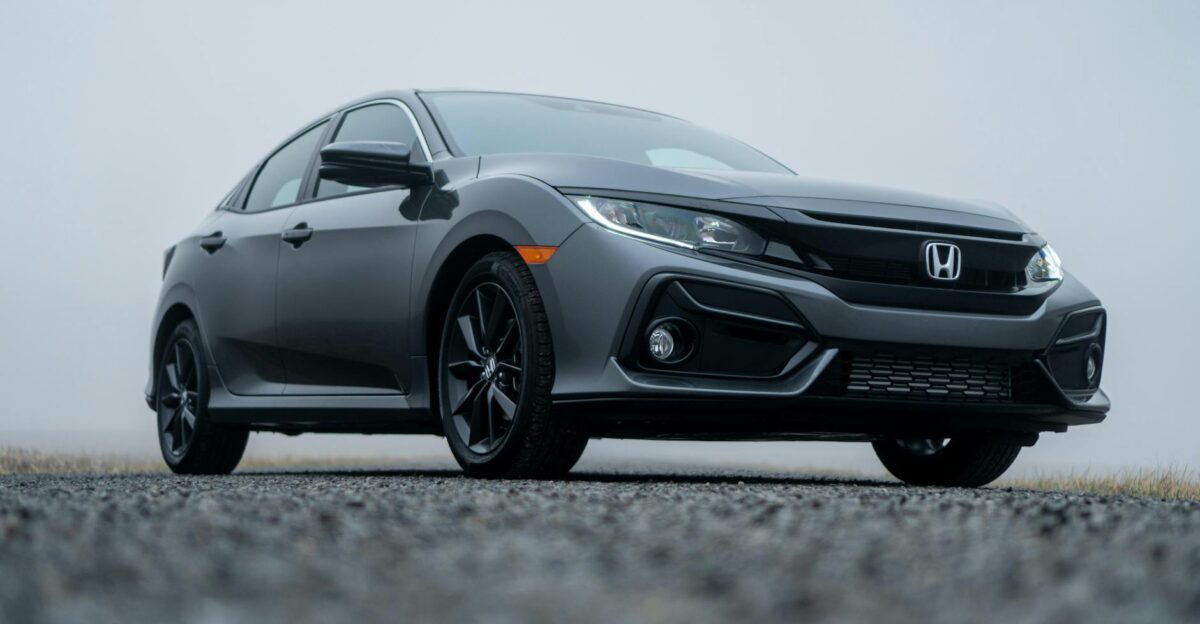 A sleek Honda Civic parked on a misty day in Fort Wayne Indiana