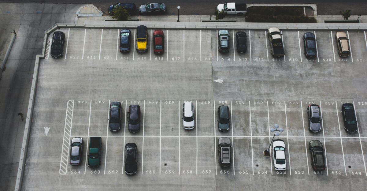 aerial view of cars parked on parking lot