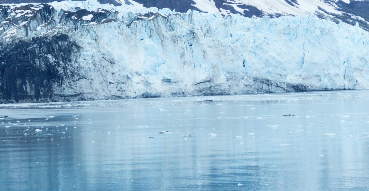 mountain reflecting on body of water