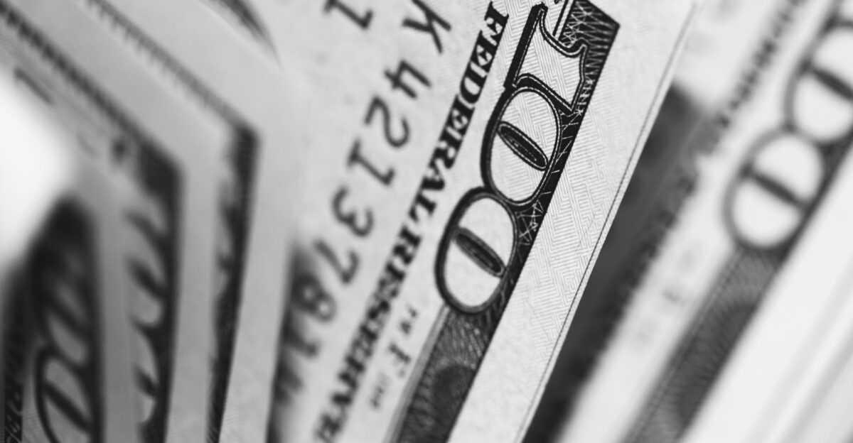 closeup photo of 100 US dollar banknotes