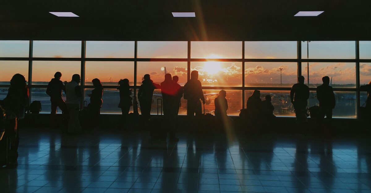 silhouette of people inside airport