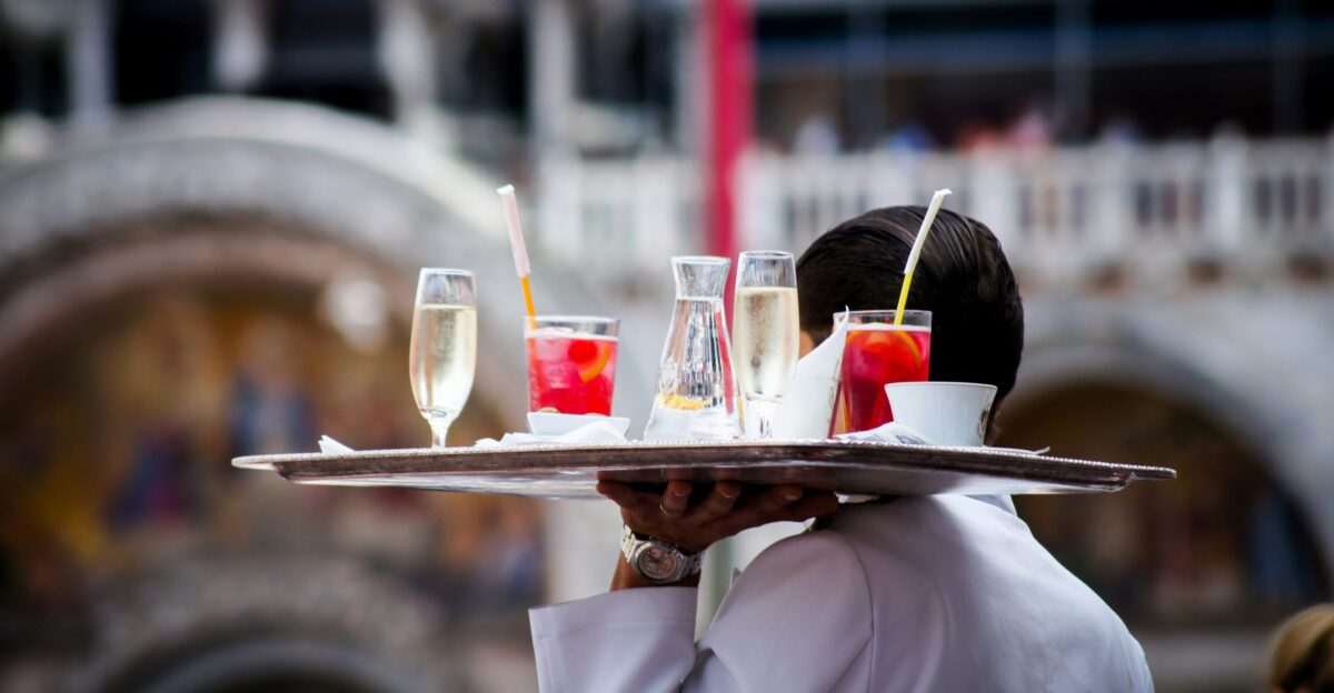 waiter serving beverages