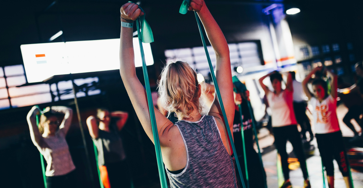group of people in gym while exercising
